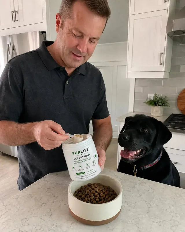 Pet parent with their dog and FurLife Colostrum+